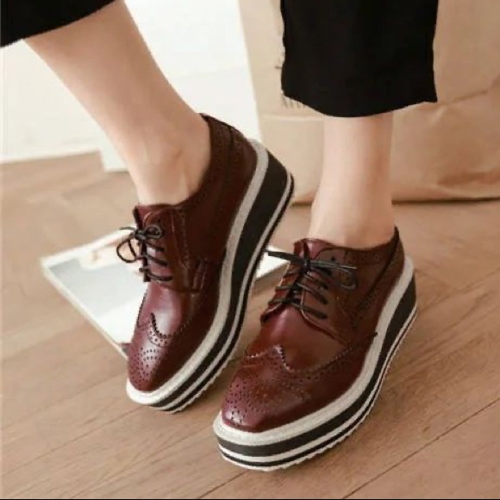 Prada wingtip Oxford brogues with striped platform